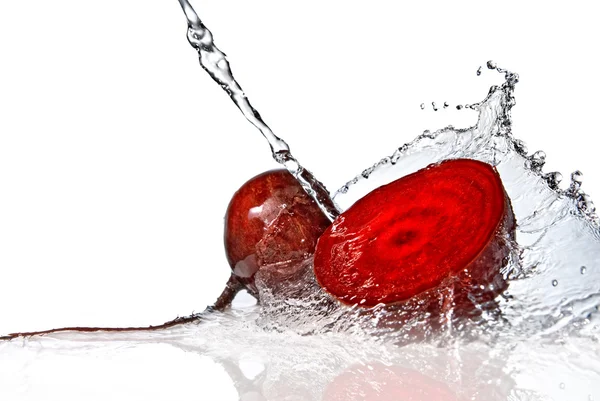 Red beet with water splash — Stock Photo, Image