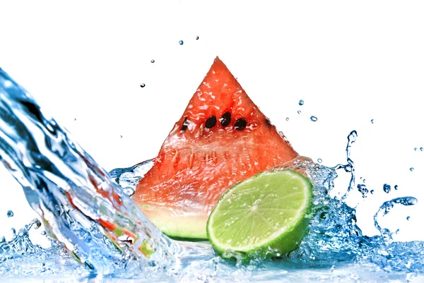 Watermelon with lime and water splash — Stock Photo, Image