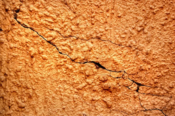 Konsistens av gamla stuckaturer väggen med sprickor — Stockfoto