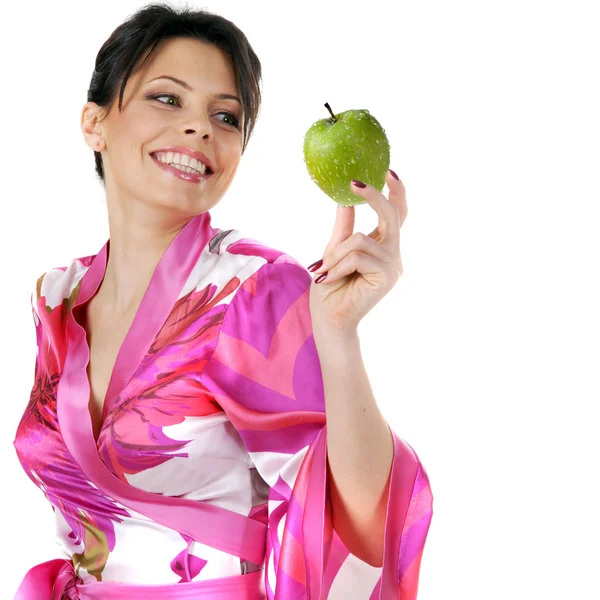Young beautiful happy woman holding green apple on white — Stock Photo, Image