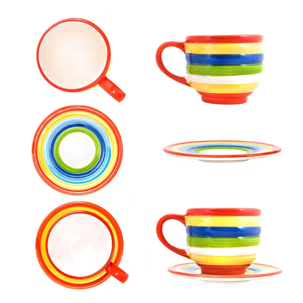 Керамічна кумедна кольорова чашка з тарілкою ізольована на білому — стокове фото