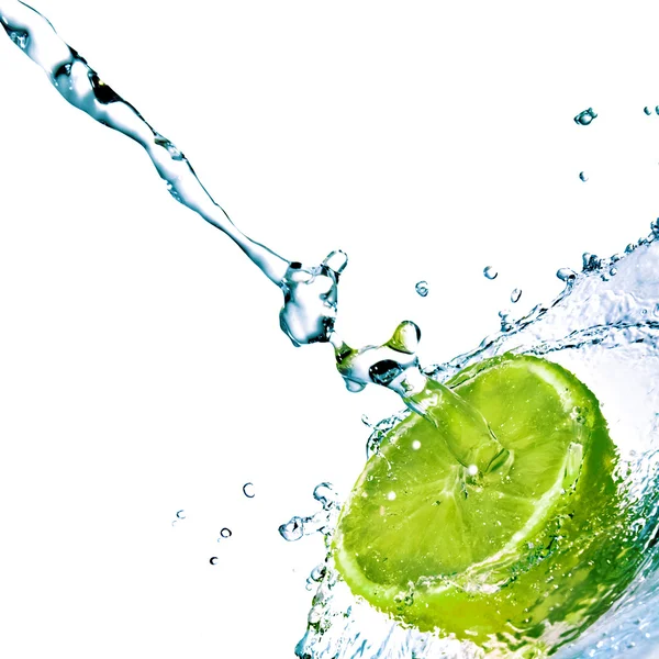 Fresh water drops on lime isolated on white Royalty Free Stock Images