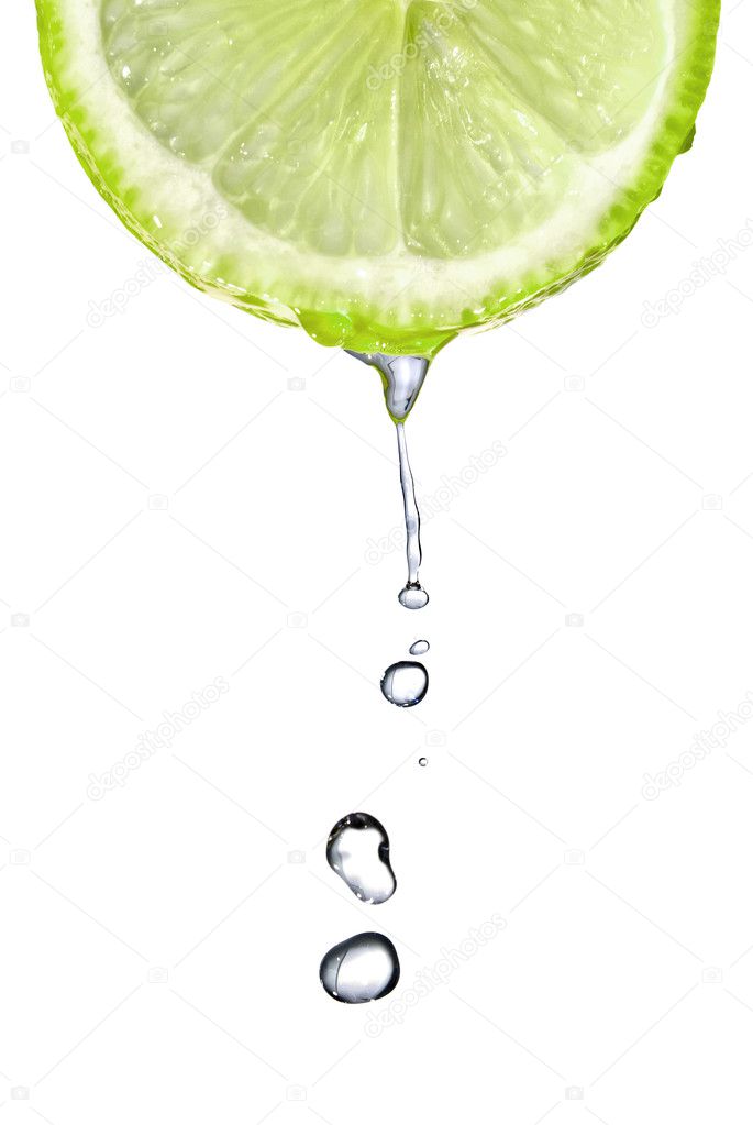 Fresh lime slice with water drops