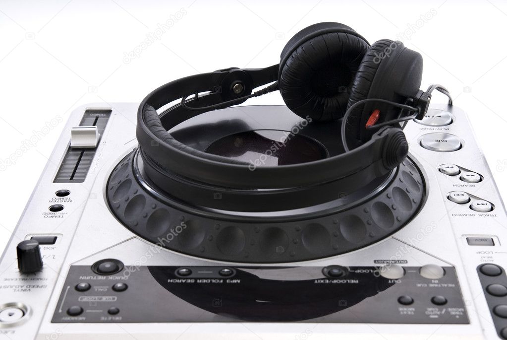 Dj mixer with headphones isolated on white