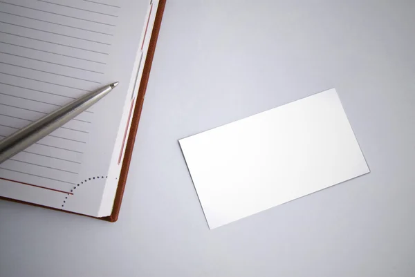 Empty business card with diary and pen — Stock Photo, Image