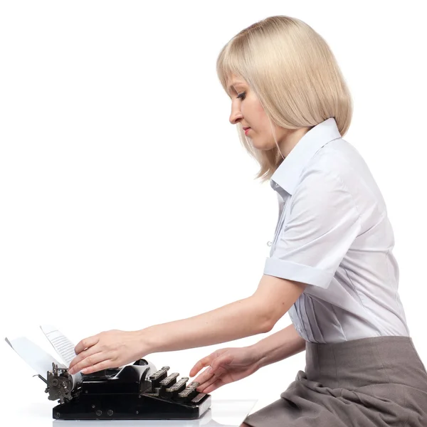 Business woman with vintage typing machine on white — Stock Photo, Image