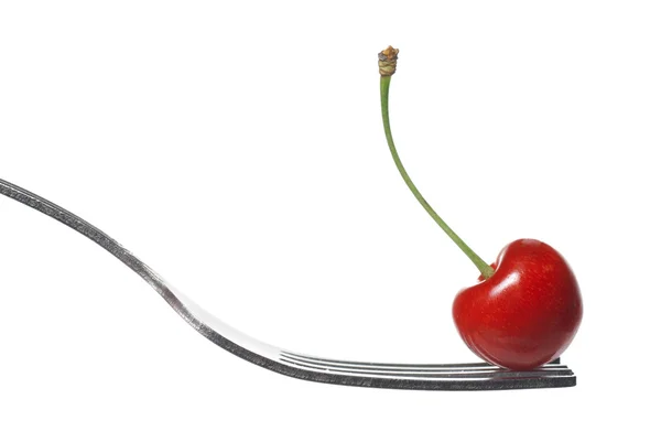 Red cherry on fork isolated on white — Stock Photo, Image