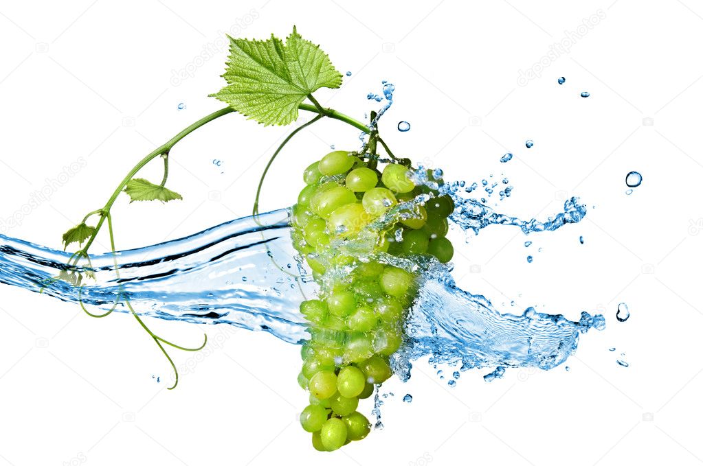 Green grape with water with splash isolated on white