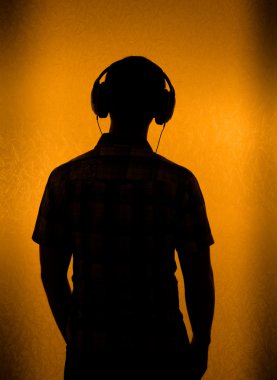 Silhouette of man with headset clipart