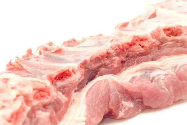 Côtes de porc non cuites et viande isolée — Photo