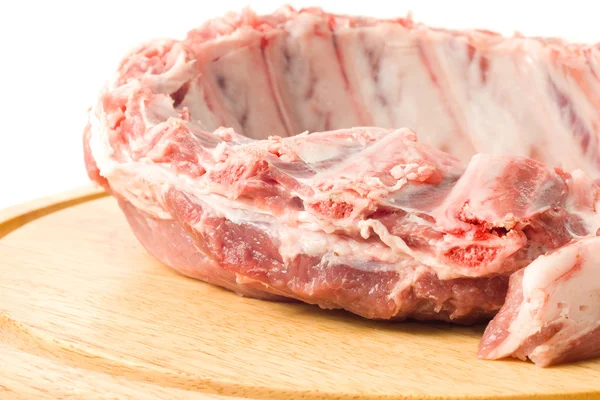 Closeup of Pork ribs on hardboard — Stock Photo, Image