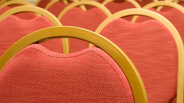 Close-up van rode stoel in de conference hall — Stockfoto