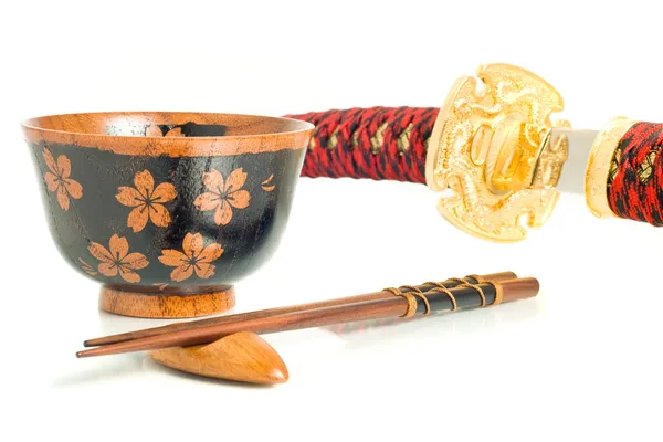 Japanse cultuur. Katana, eetstokjes en bowl — Stockfoto