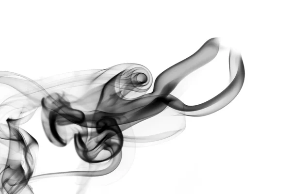 Черные абстрактные кривые дыма на белом — стоковое фото