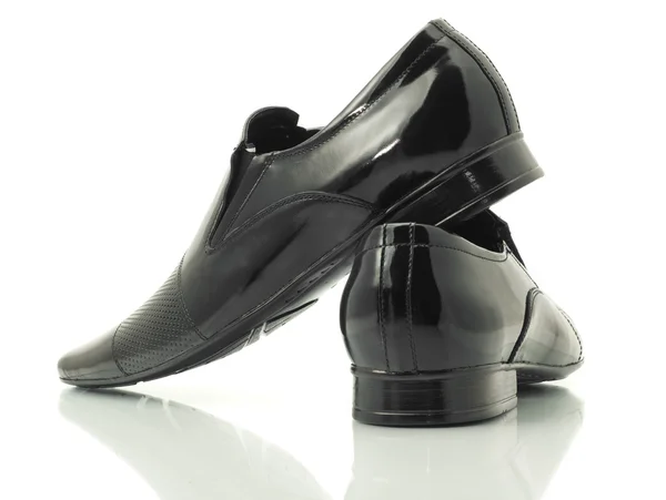 Zijkant en achterkant weergave van octrooi-lederen schoenen — Stockfoto