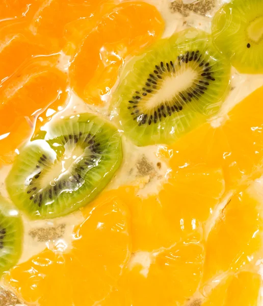 Plátky kiwi, pomeranče a mandarinky segmenty — Stock fotografie