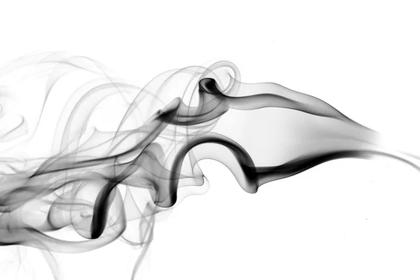Sopro abstrato de fumaça preta no branco — Fotografia de Stock