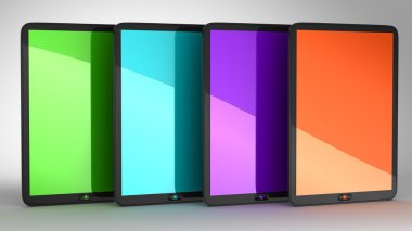 Group of four Tablets PCs with colored displays clipart
