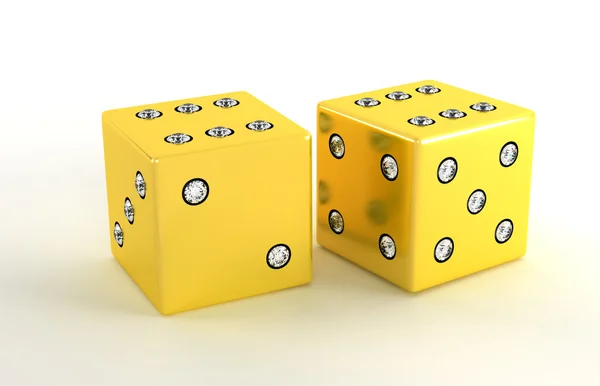 Two golden polished dies with diamonds — Stock Photo, Image