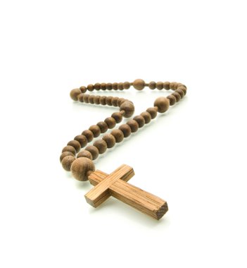 Wooden rosary beads on white