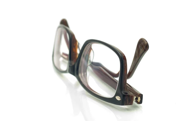 Moderne Kunststoffbrillen über Weiß — Stockfoto