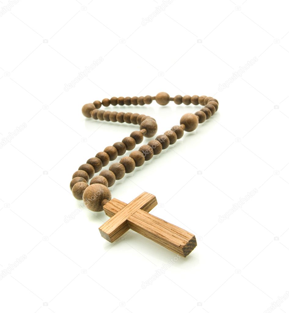 Wooden rosary beads on white