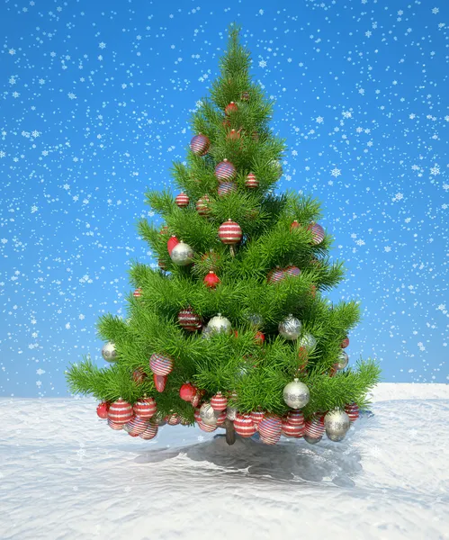 Firtree with Xmas decoration during snowfall — Stock Photo, Image