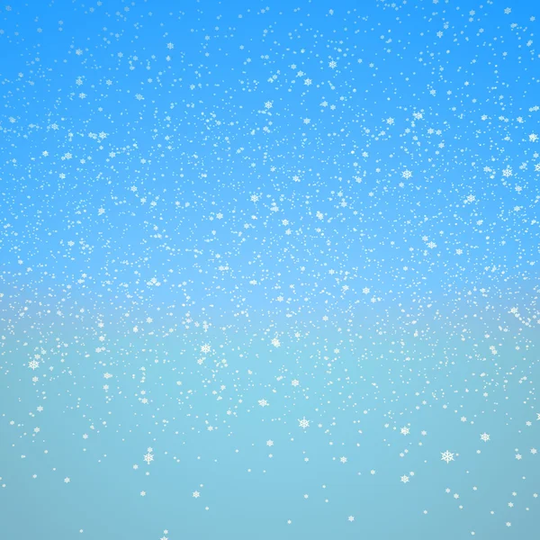 Snöflingor och blå himmel — Stockfoto