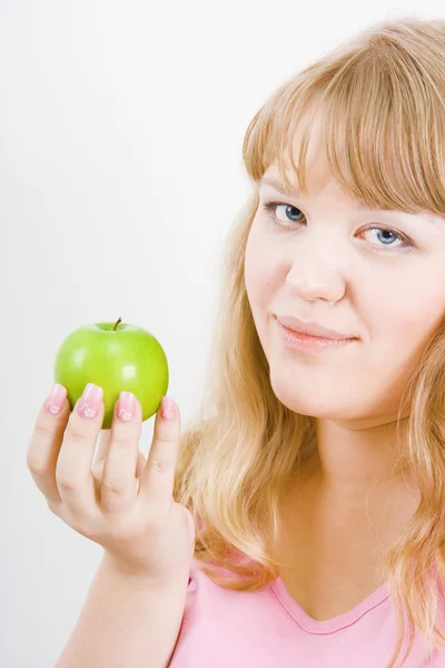 Girl and an apple — Stock Photo, Image