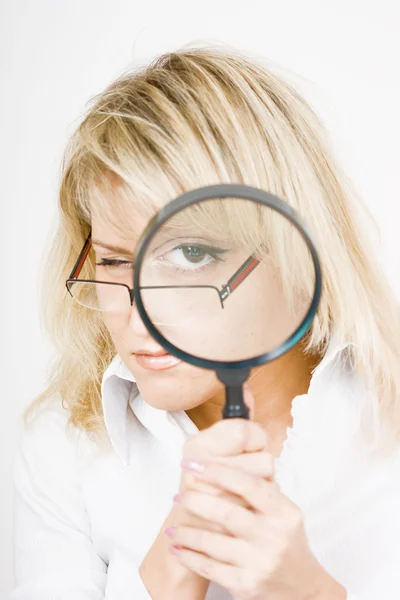 stock image Girl with a magnifying glass