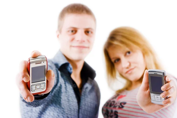 Giovani con telefoni cellulari — Foto Stock