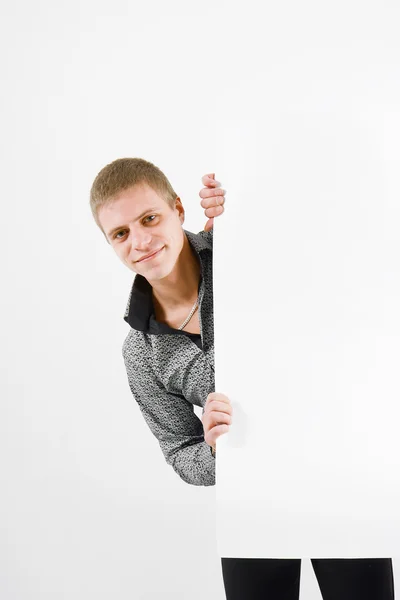 Jonge man met een bordje — Stockfoto