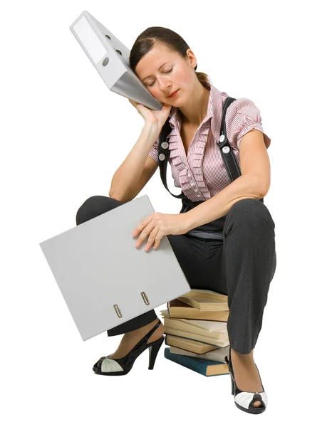 A menina dorme nos livros — Fotografia de Stock