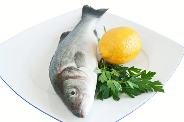 Sea bass with lemon and parsley — Stock Photo, Image