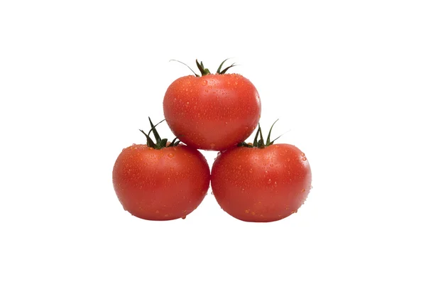 Grupo de tomates maduros em um fundo branco — Fotografia de Stock
