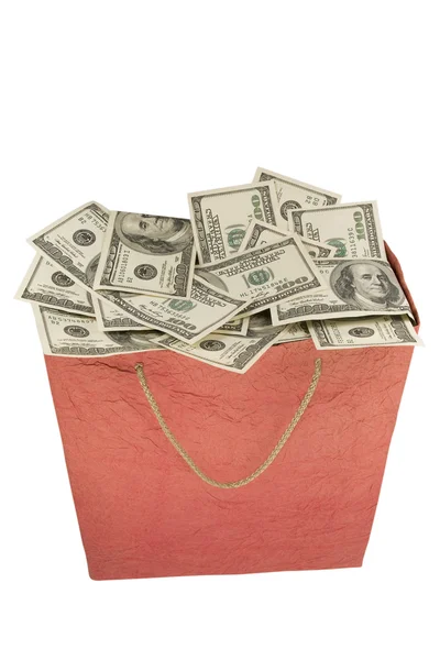 Geld in een rode boodschappentas. — Stockfoto