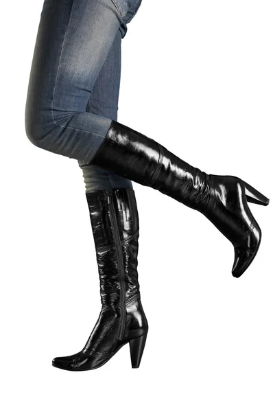 Female feet in high boots — Stock Photo, Image