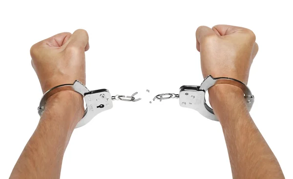 Hands and breaking handcuffs — Stock Photo, Image