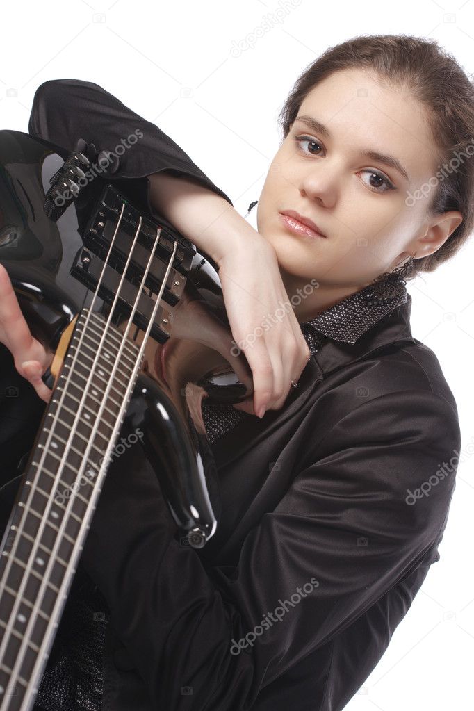 Beautiful girl with a bass guitar