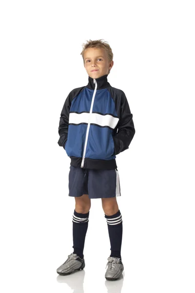 Niño en uniforme de fútbol Imagen de archivo