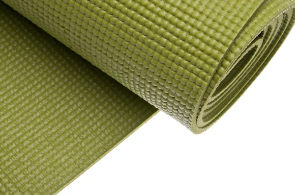 Зелений йога вправи килимок — стокове фото