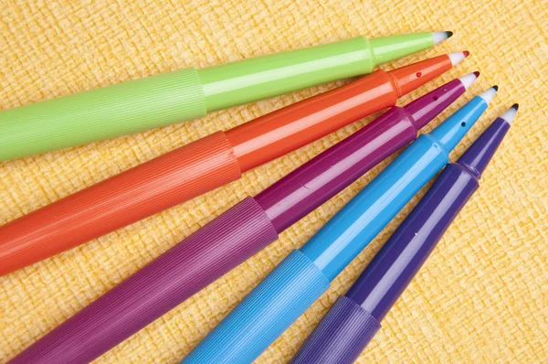 Vibrant Pens on Yellow Background — Stock Photo, Image