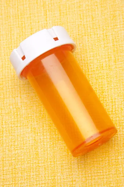 Garrafa de prescrição em Amarelo — Fotografia de Stock