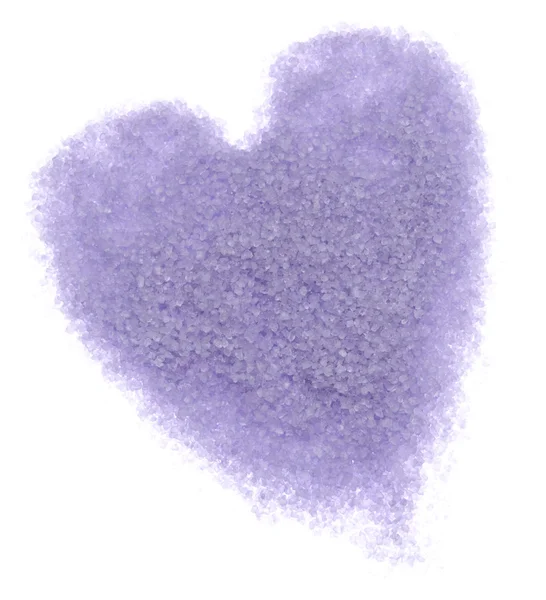 Пурпурные соли для ванн в форме слуха — стоковое фото