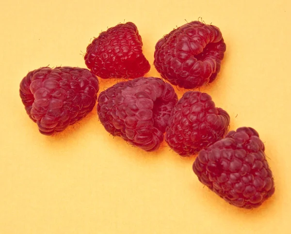 Raspberries on Yellow — Stock Photo, Image