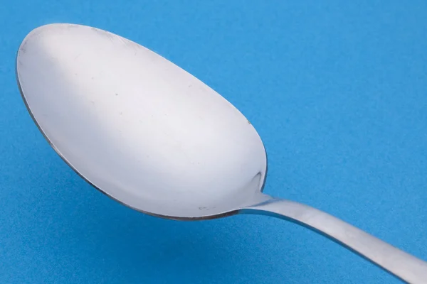 Spoon on Blue — Stock Photo, Image