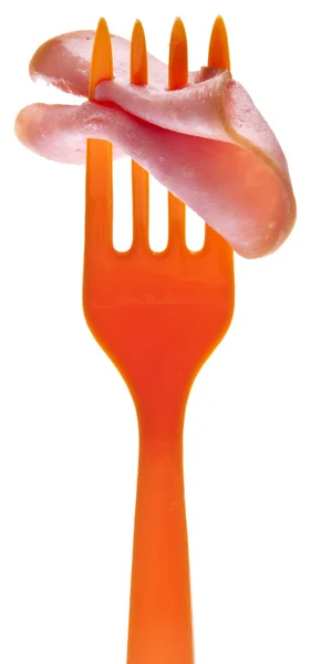 Jamón en rodajas en un tenedor vibrante — Foto de Stock