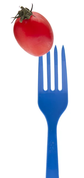 Tomate cerise sur une fourchette vibrante — Photo