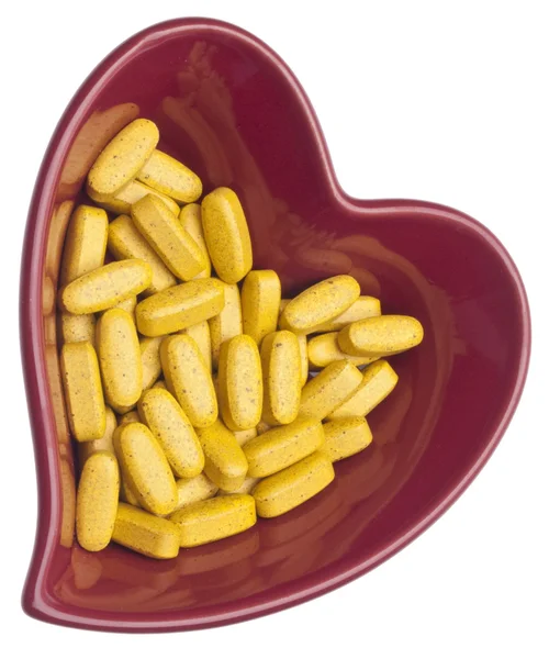 Таблетки для здоров'я серця — стокове фото