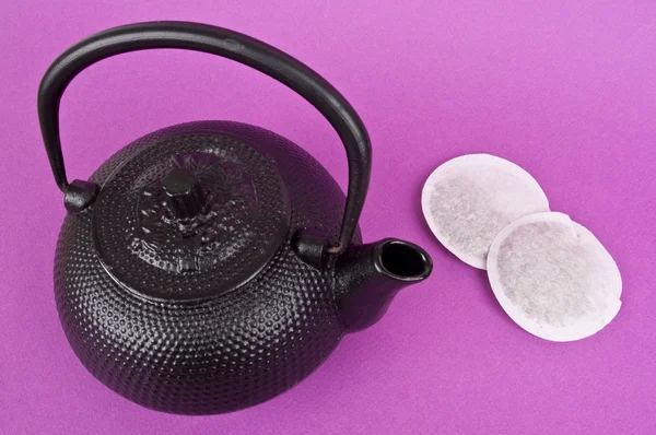 Tazza da tè con bustine di tè — Foto Stock